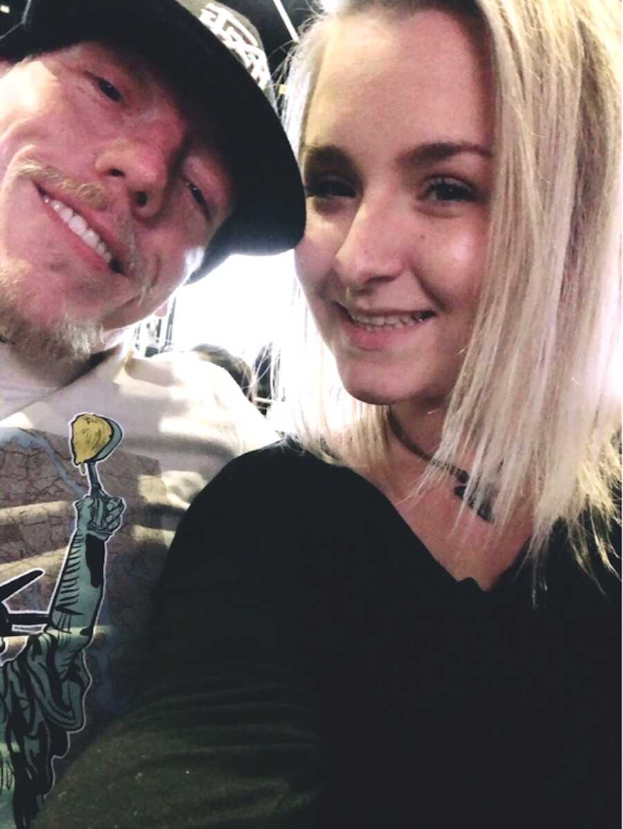 Couple takes a selfie while both are smiling