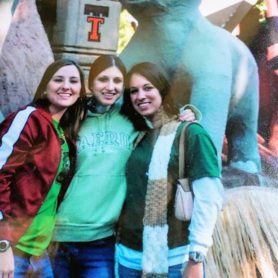 emancipated teenager with two friends at a theme park