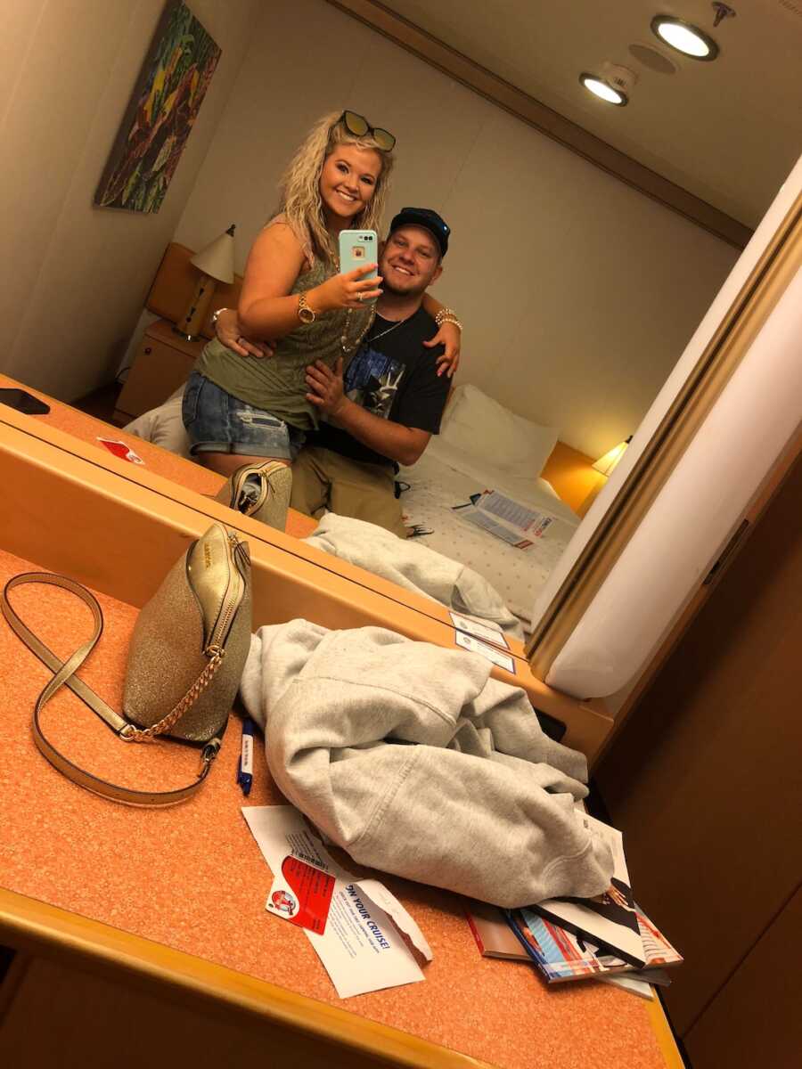 husband and wife in room on cruise