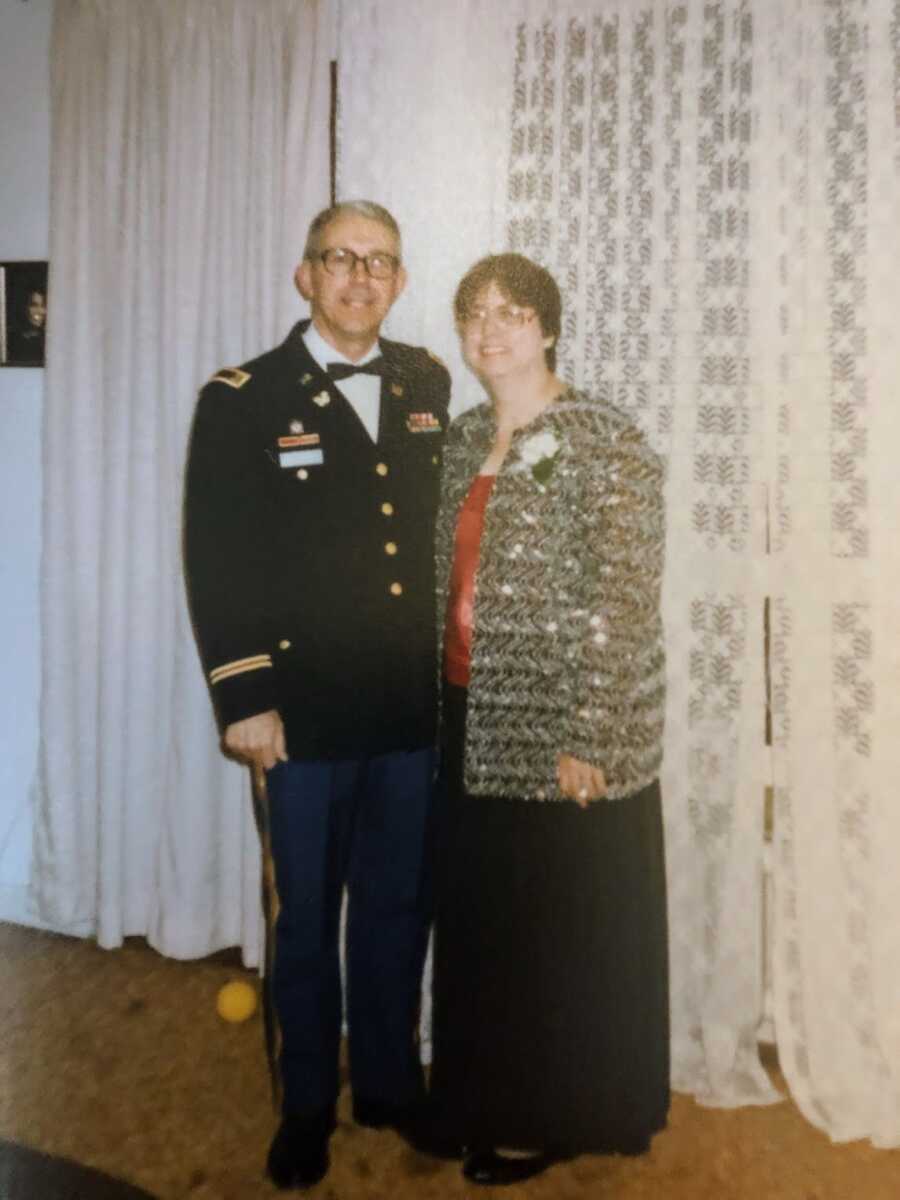 husband in navy uniform with his wife