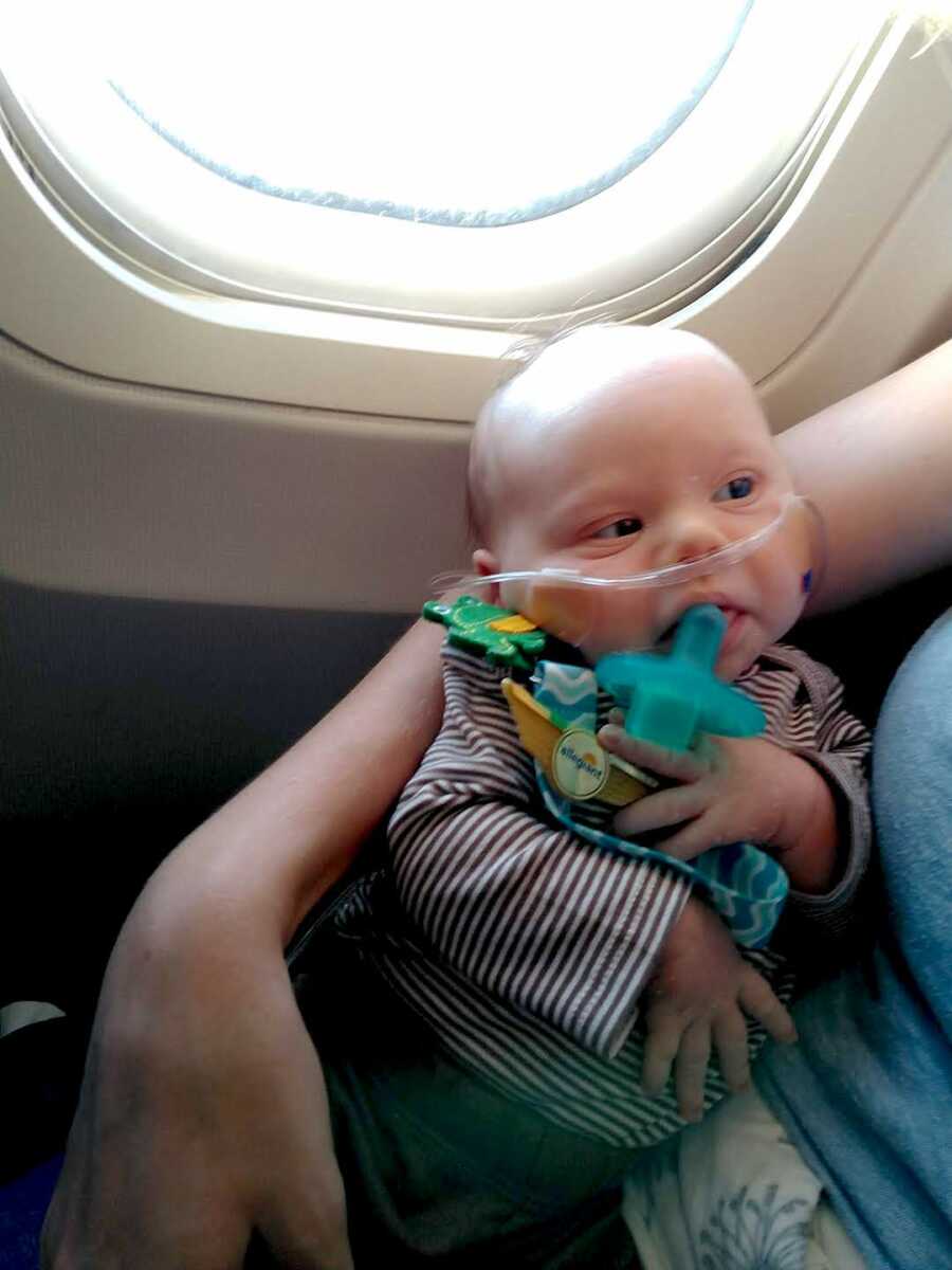 Baby with Down Syndrome on flight with oxygen