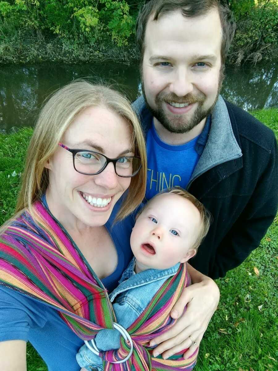 adoptive parents with their baby boy with Down Syndrome