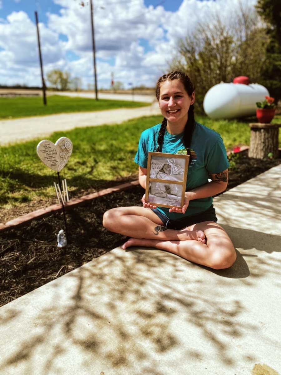 mother holding memory box for stillborn daughter