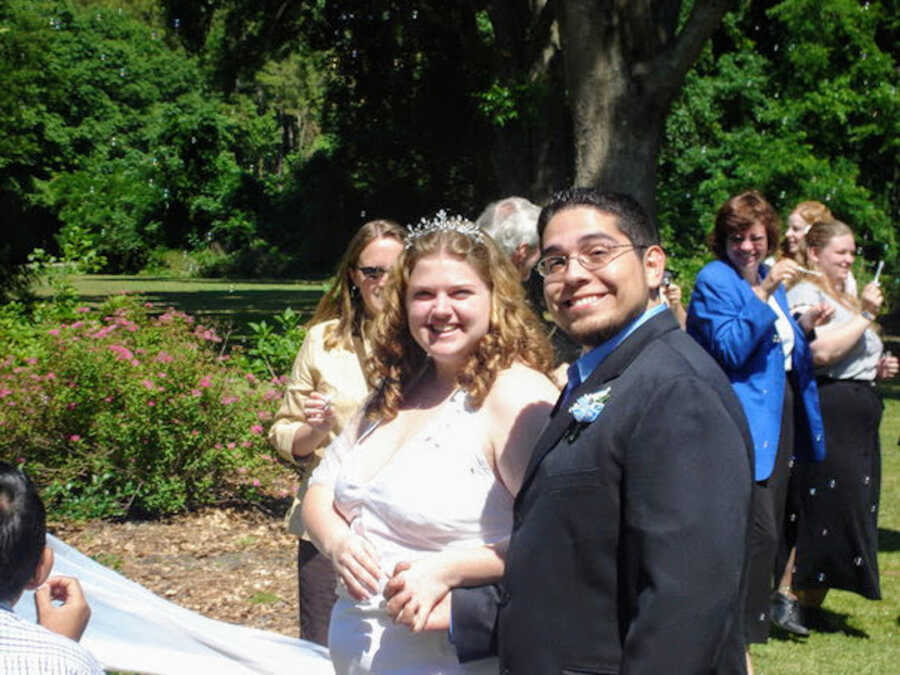 wedding picture of bride and groom standing together