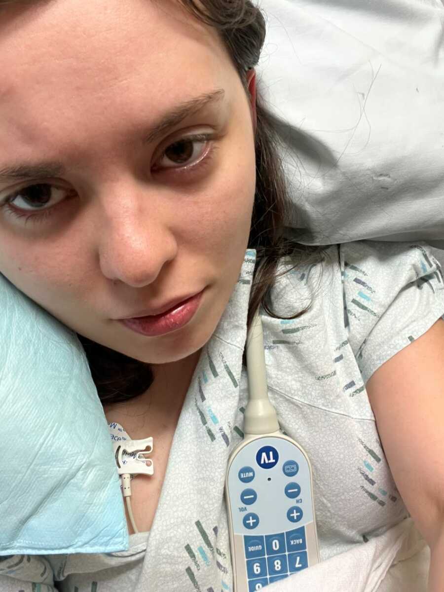 POTS illness patient taking selfie in hospital gown
