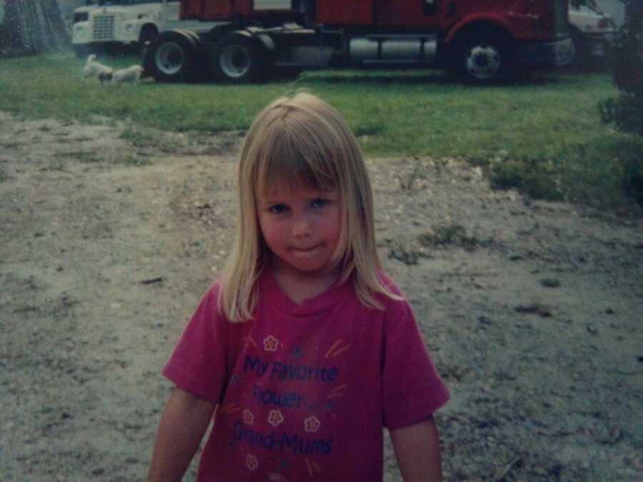 domestic abuse survivor as a child with blonde hair
