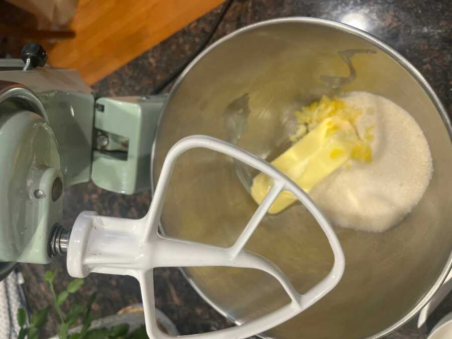 butter, lemon peels, and sugar in a large mixing bowl