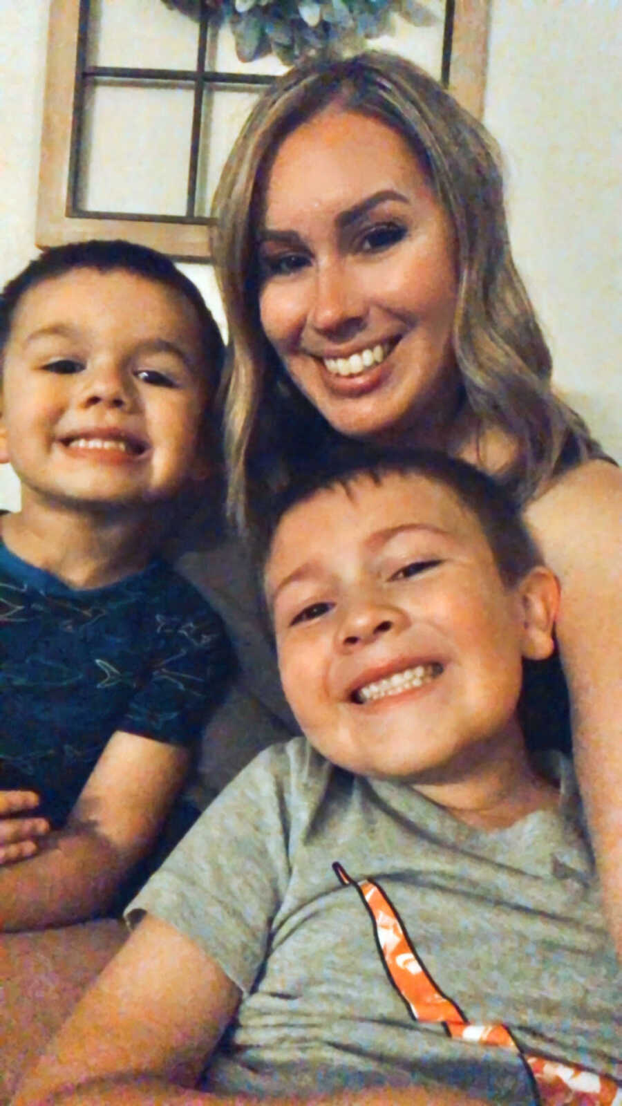 woman with chronic illness and her two younger sons