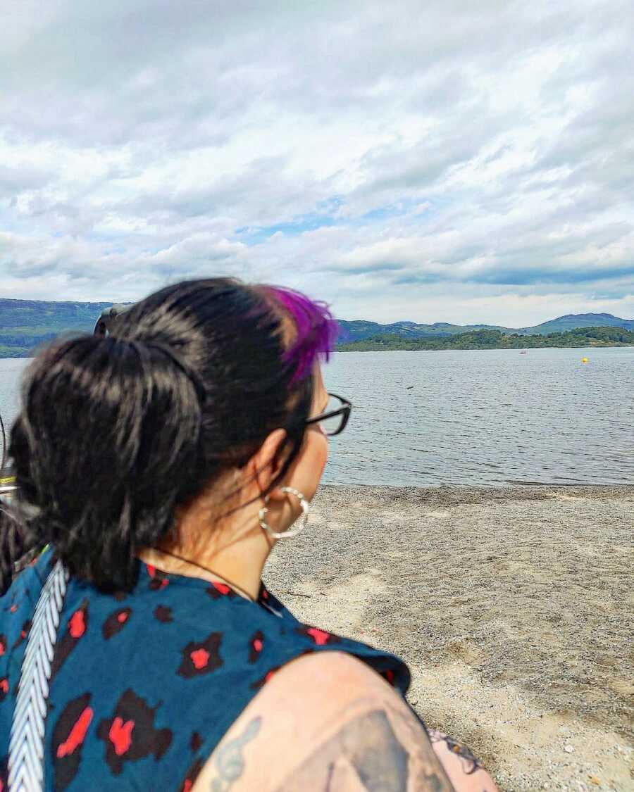 chronically ill woman looking out into the water