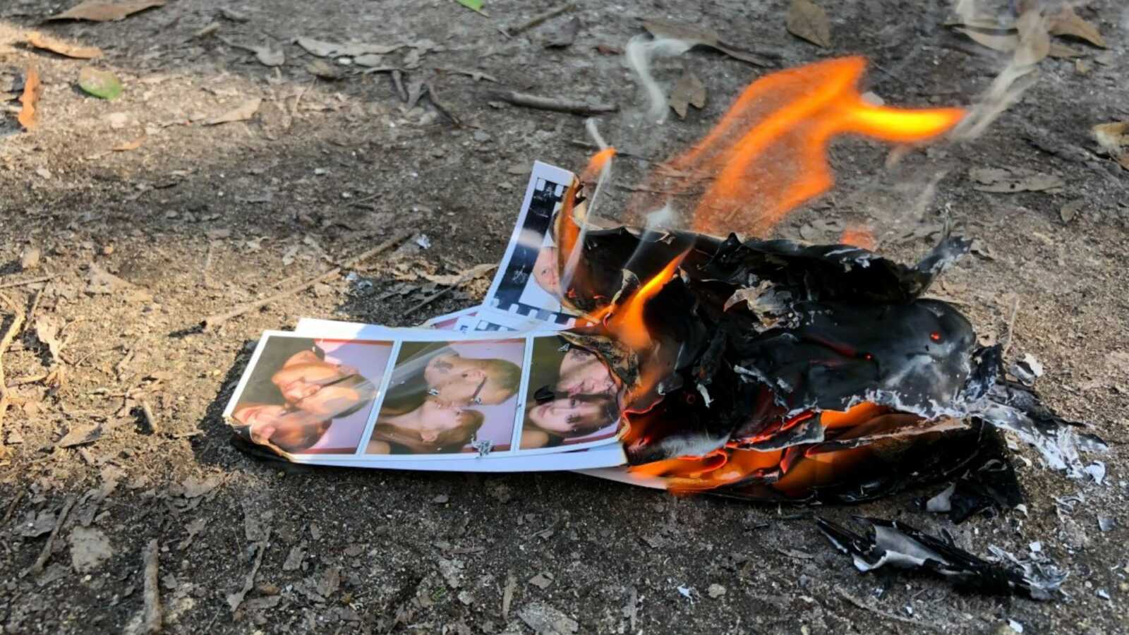 polaroids of abusive relationship being lit on fire outside