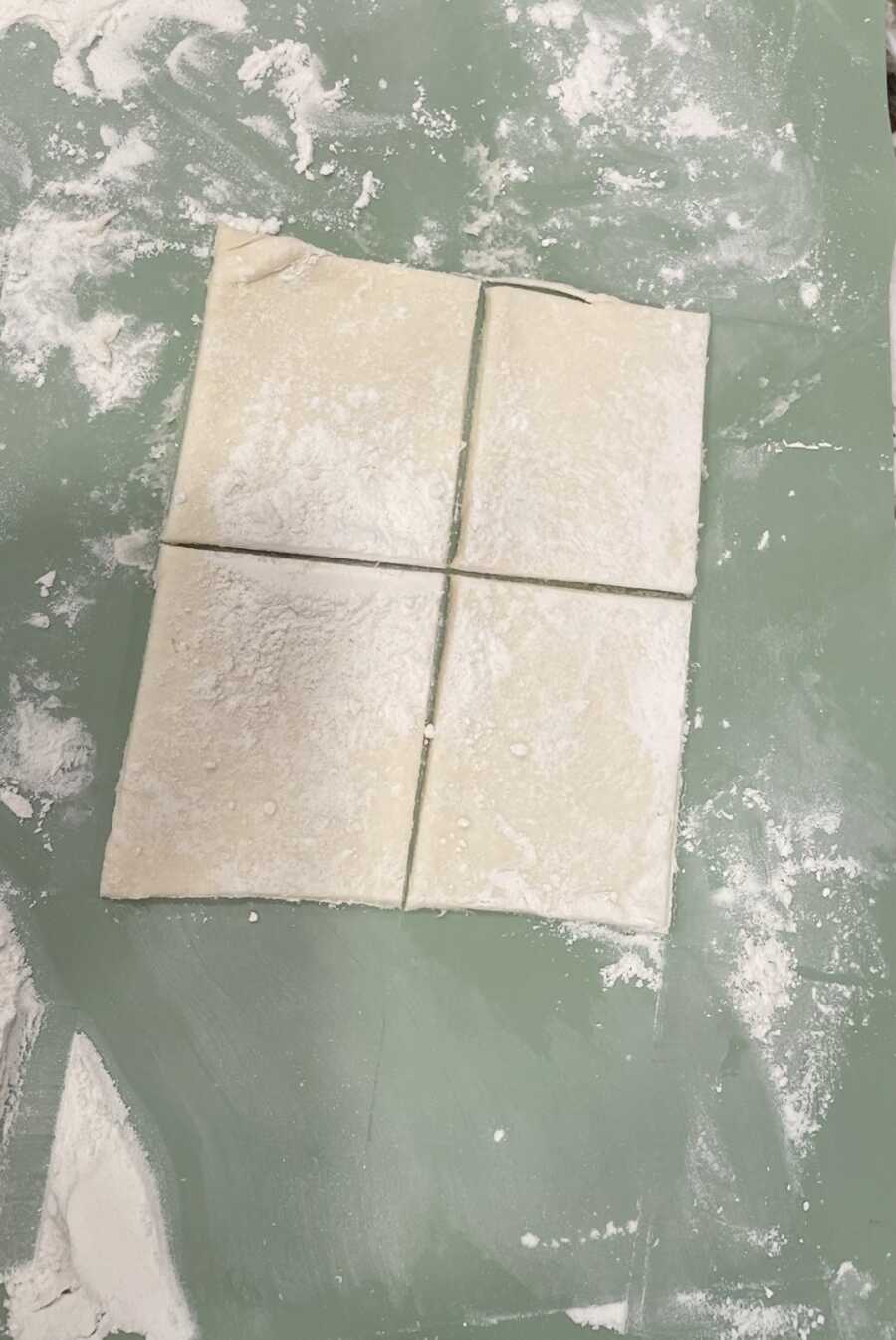 kolaches dough cut into 4 squares