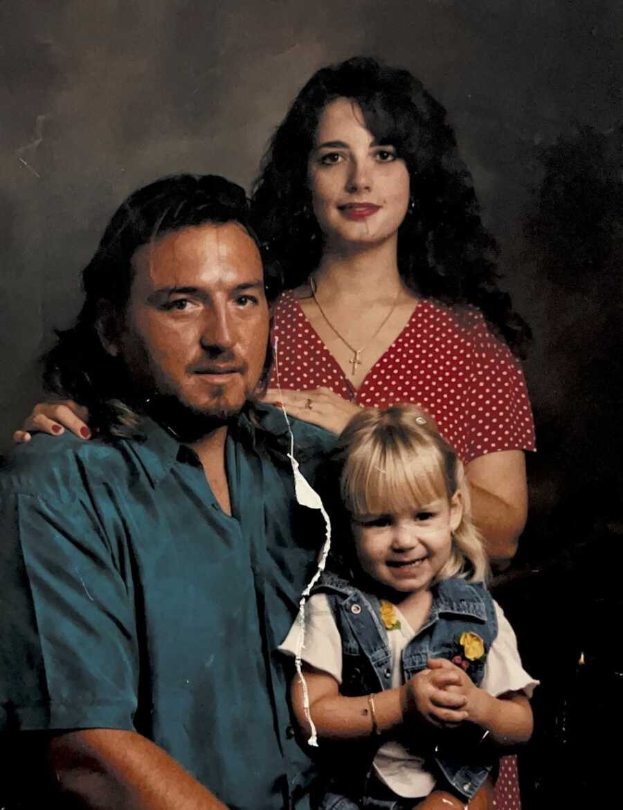 domestic abuse survivor as a child in family portrait