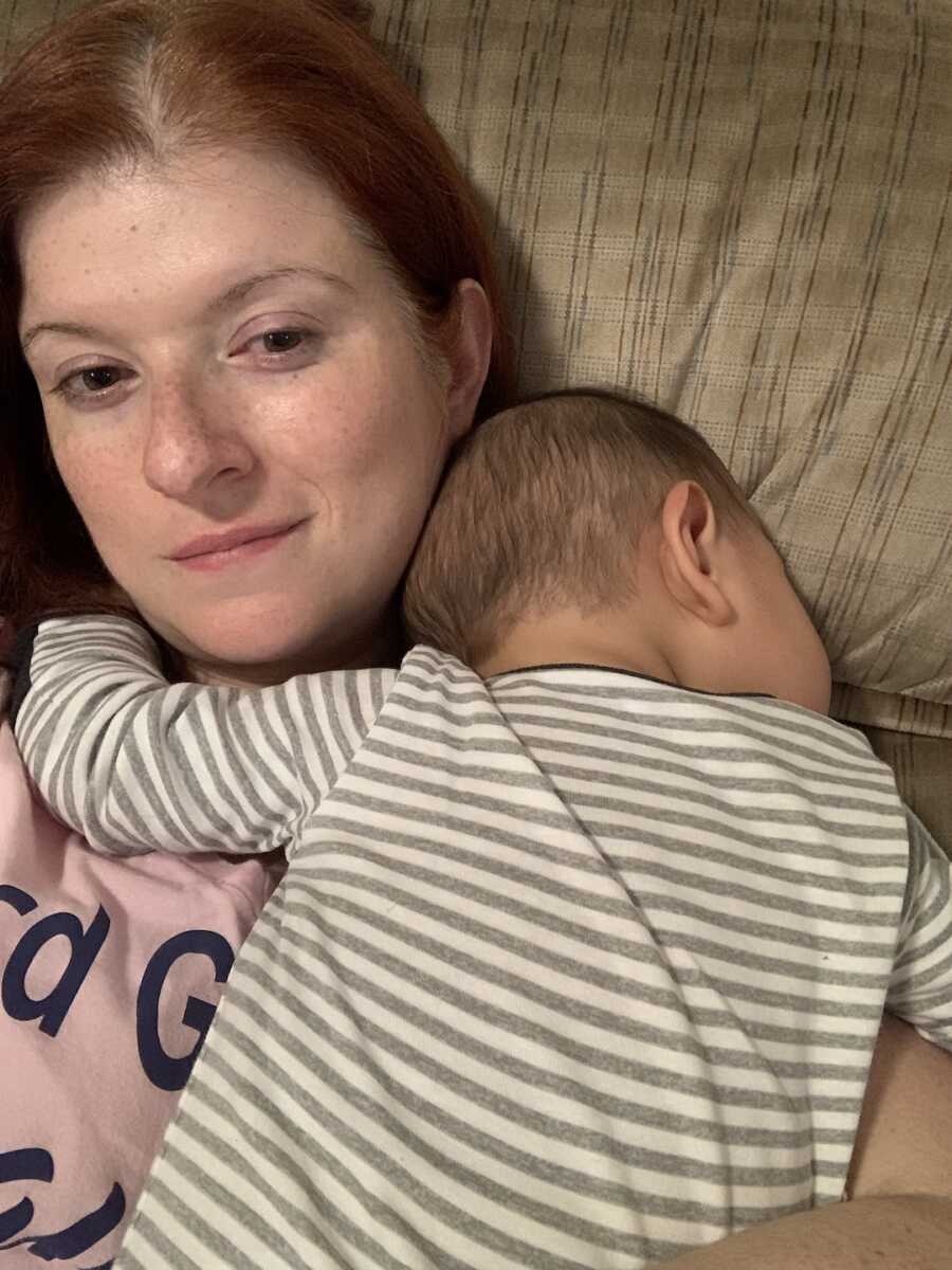 foster mom lays with baby on her chest