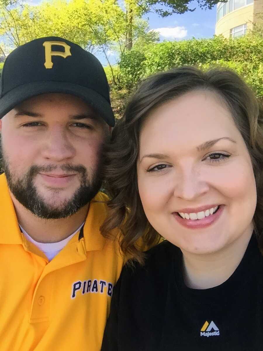 foster mother and father smiling