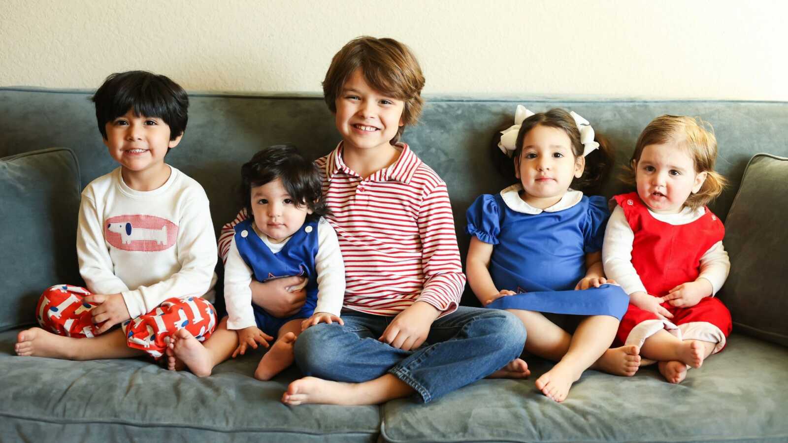 group of siblings through adoption on couch