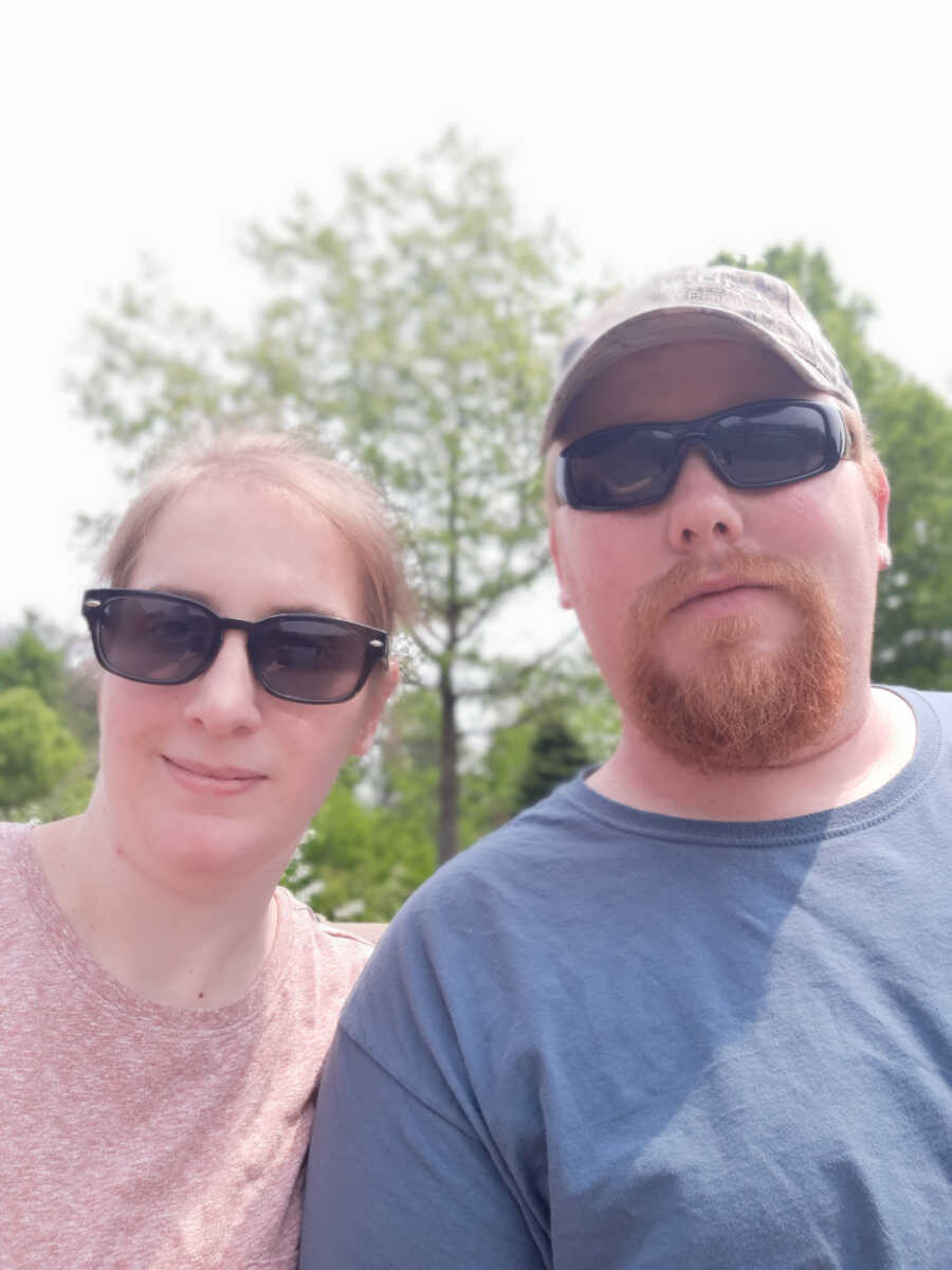 husband and wife wear sunglasses