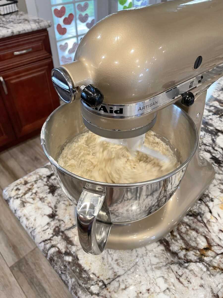 kolaches dough mixing together in stand mixer bowl