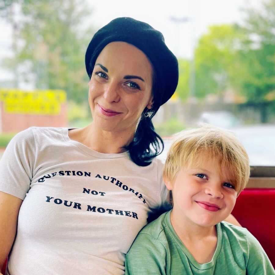 recovering alcoholic mother sitting with her son