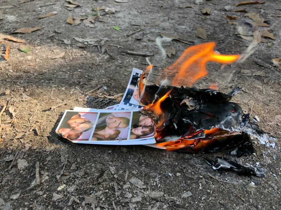 polaroids of abusive relationship being lit on fire outside