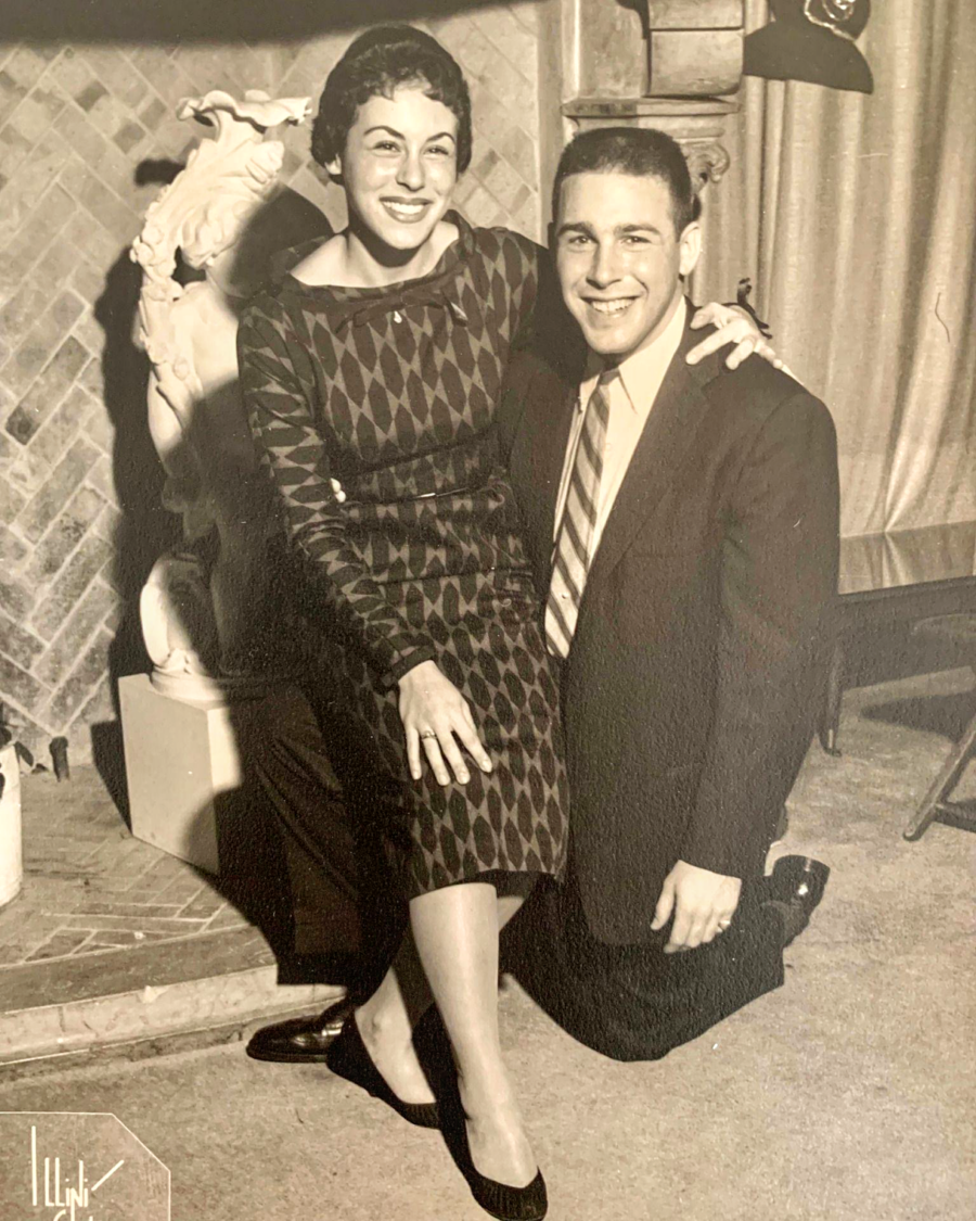 vintage photo of wife sitting on husband's knee