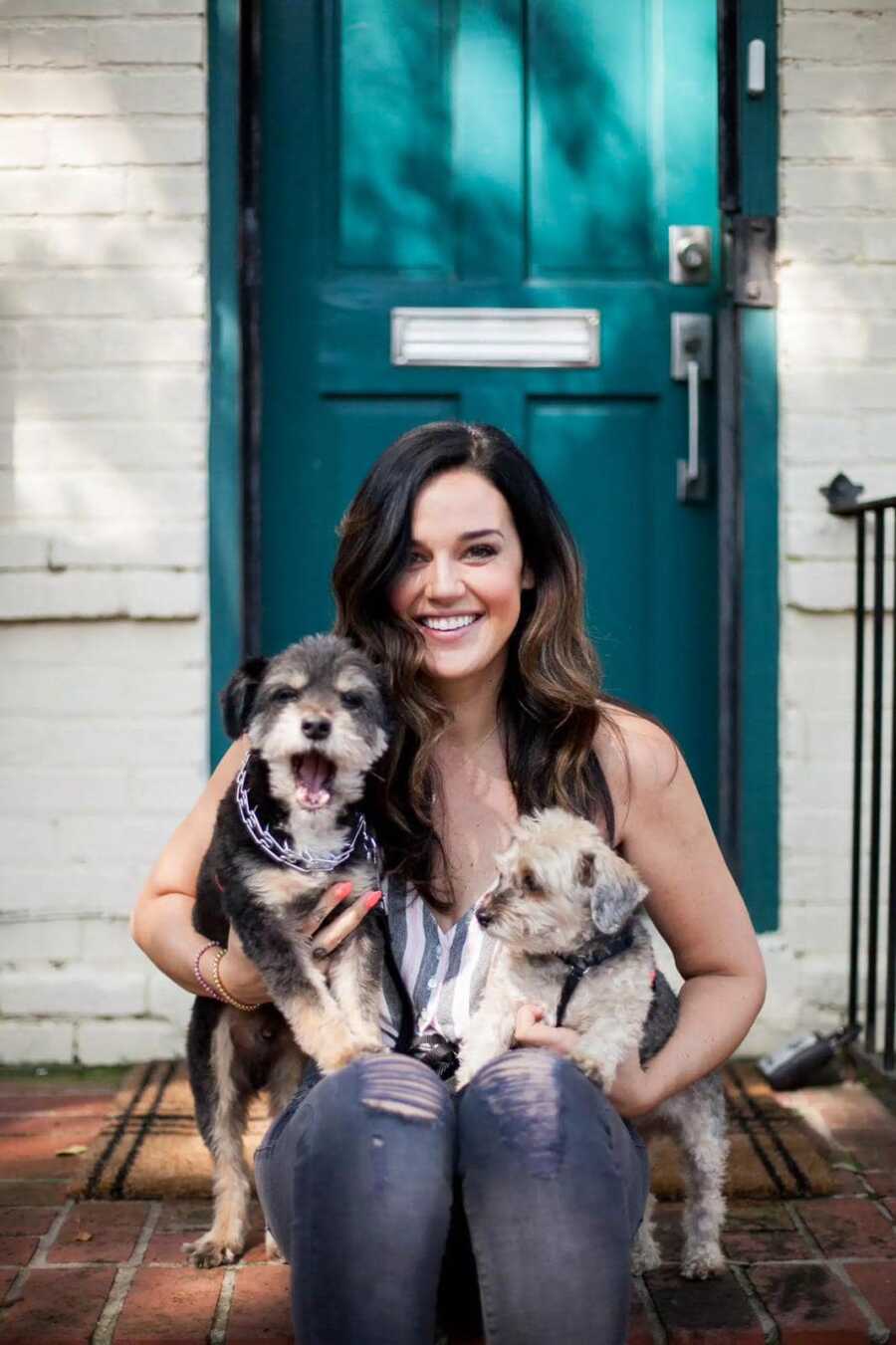 young woman with two dogs