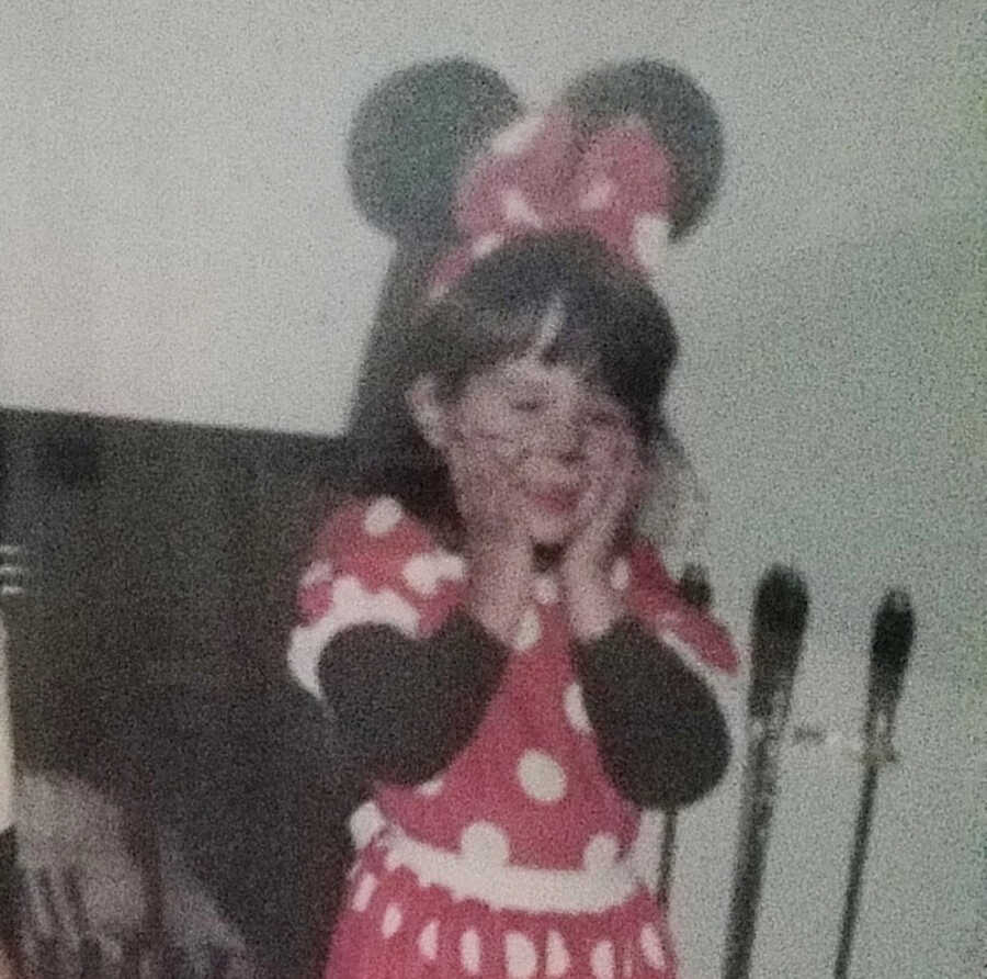 young girl dressed up as Minnie Mouse