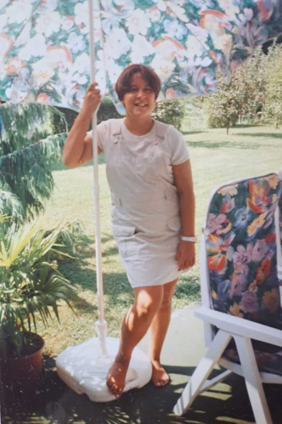 sexual abuse and eating disorder survivor posing under umbrella