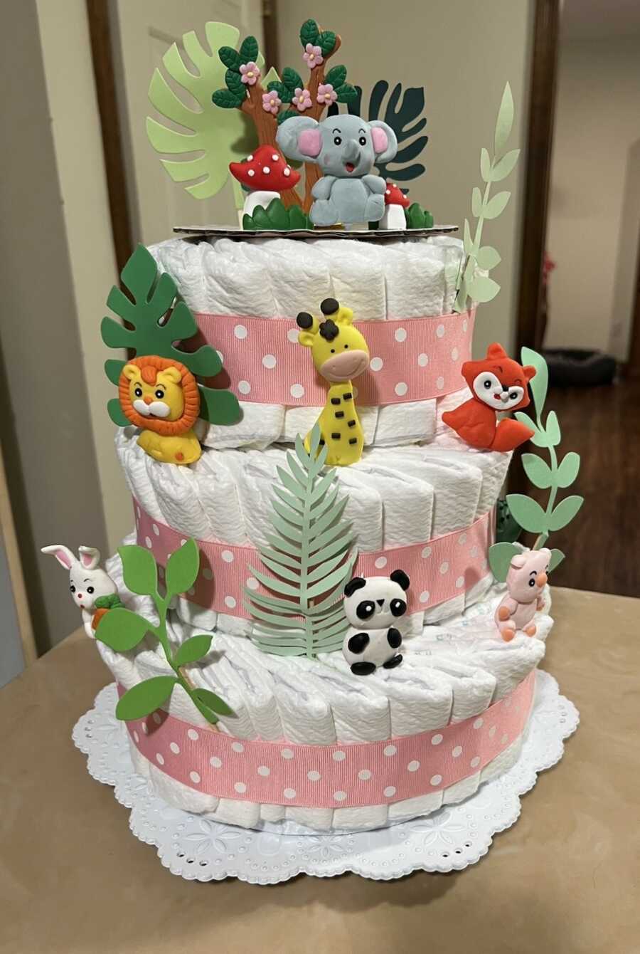 diaper cake with safari animals for twins