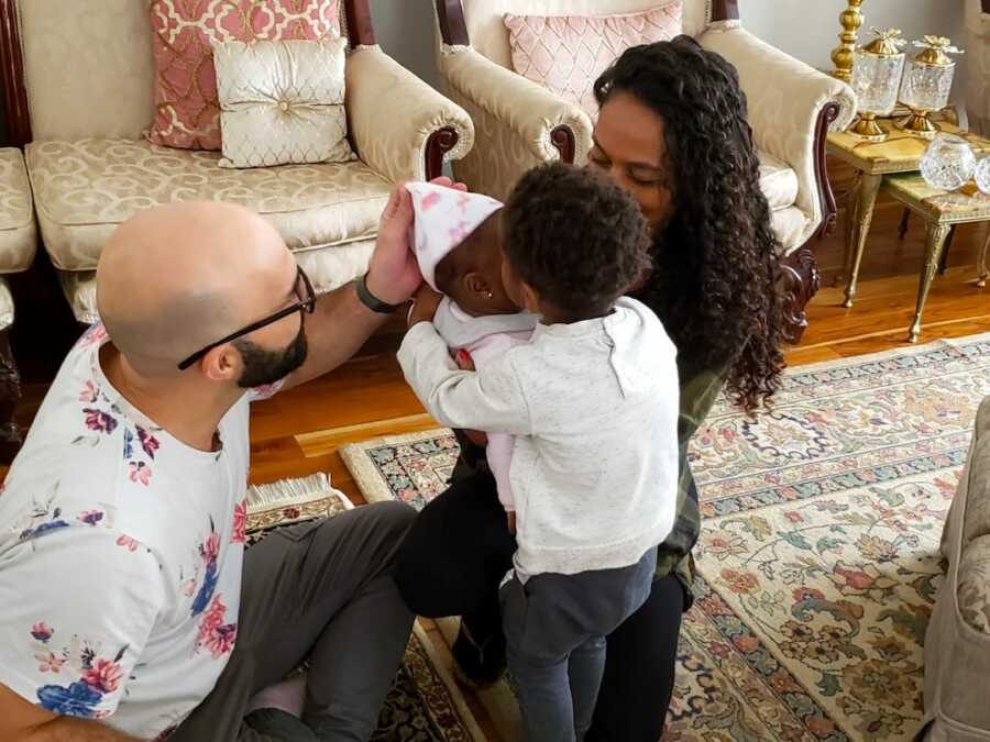 family reuniting after being separated during covid quarantine