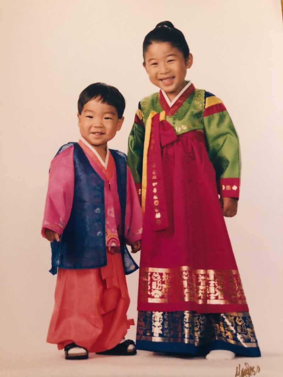 korean adoptee siblings wearing traditional Korean attire