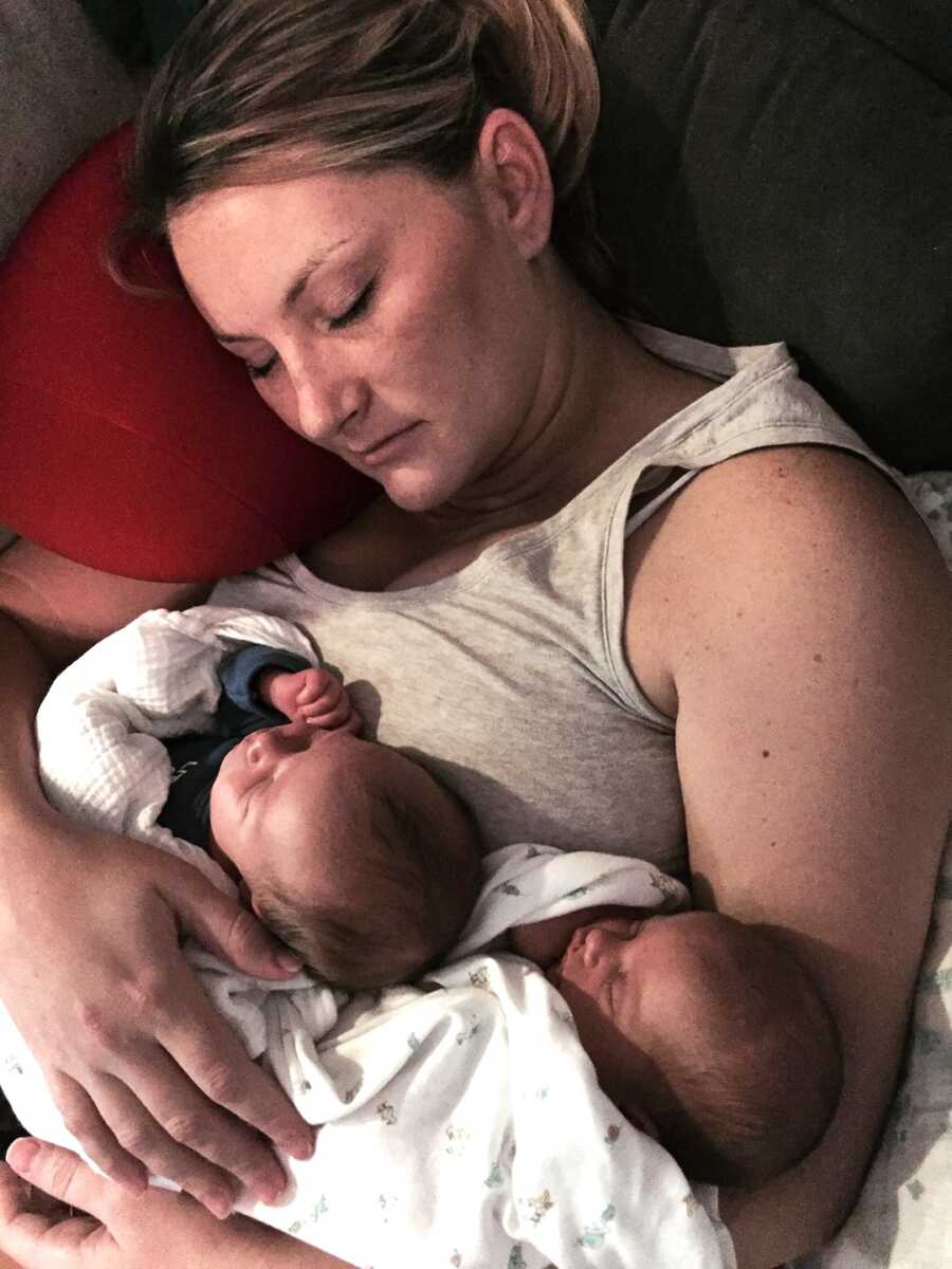 recovered alcoholic sleeps while holding her two babies