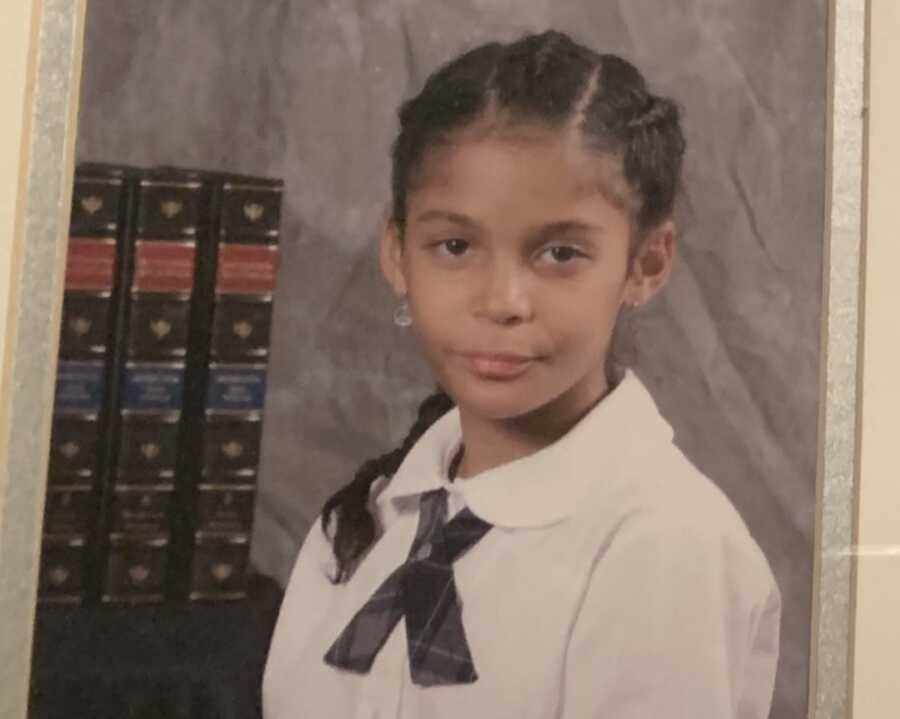 young girl in school uniform for school pictures